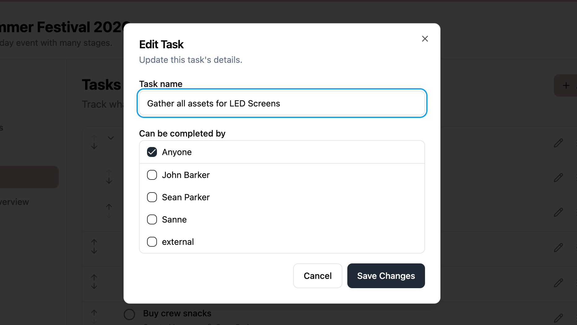 Edit Task dialog with task name field and completion permission checkboxes for team members